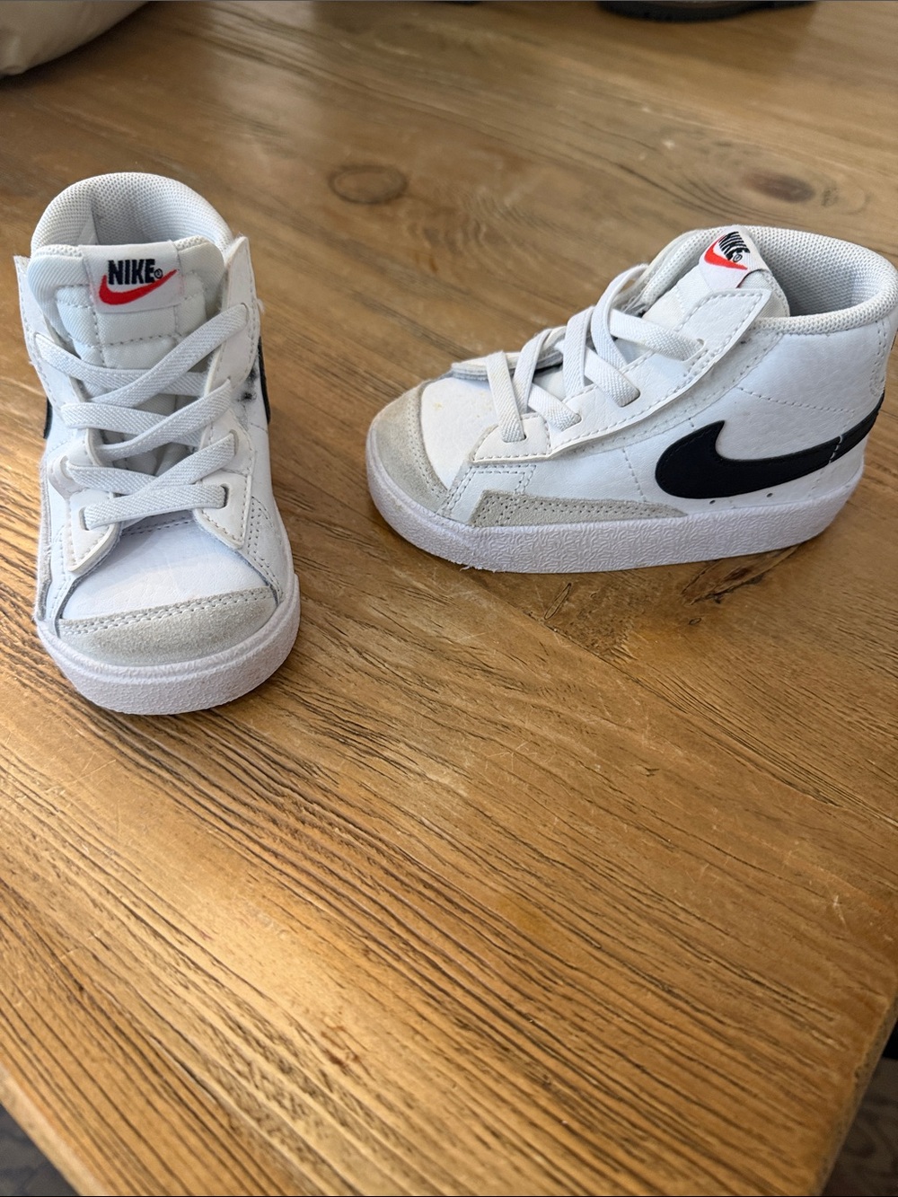 Nike Kids White and Black Mid-Top Sneakers with Red Logo Accent